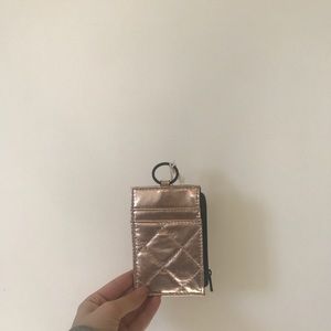 Rose gold coin pouch